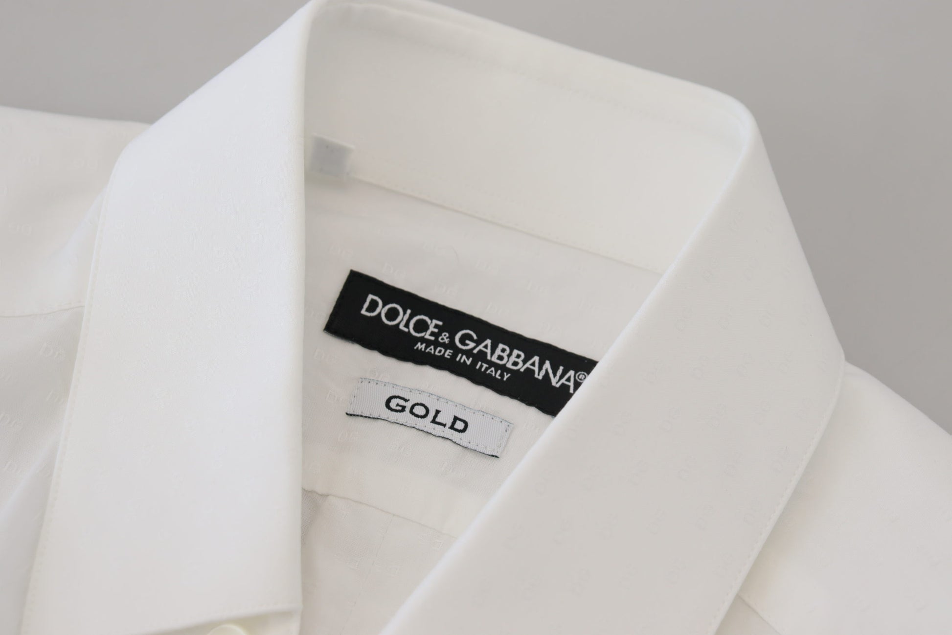 A white cotton slim fit formal dress shirt with a gold label