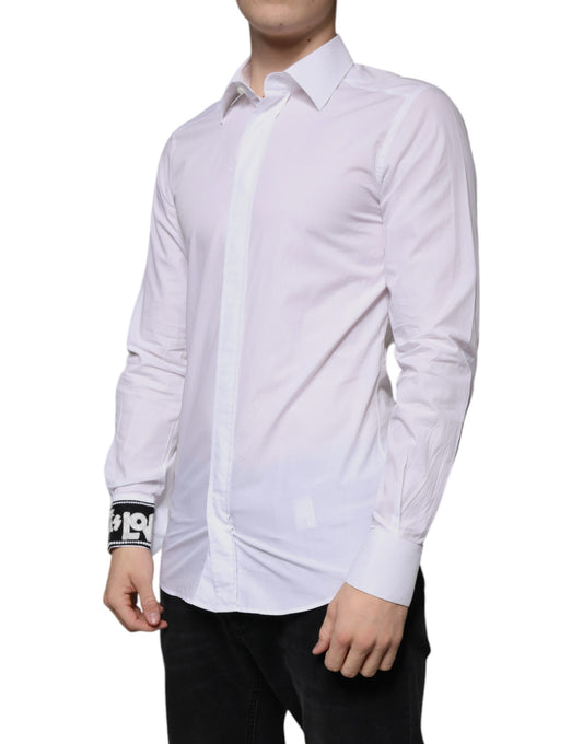 A mannequin wearing a white cotton slim fit dress shirt with long sleeves