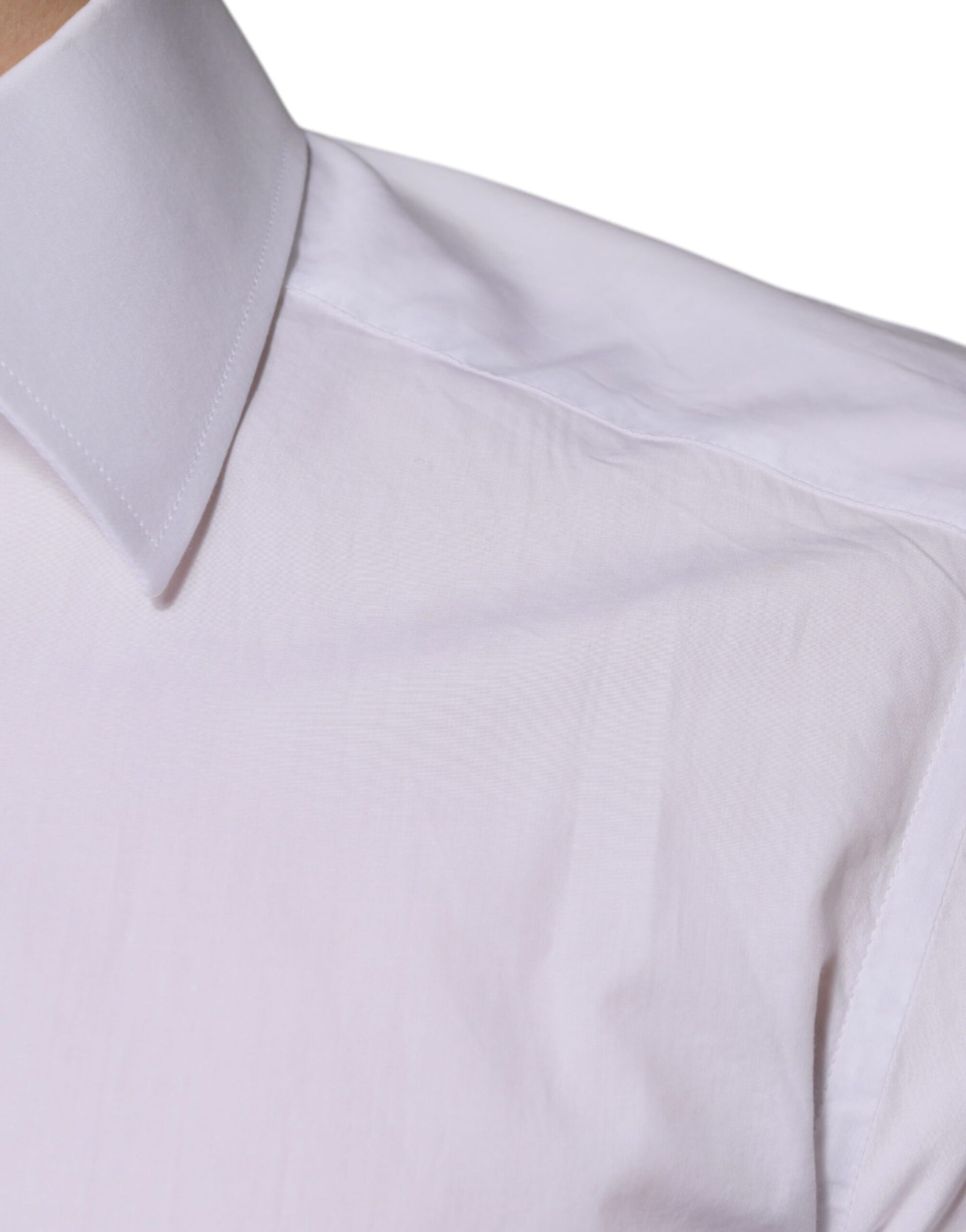 A white cotton dress shirt with a slim fit, featuring a collar and short sleeves