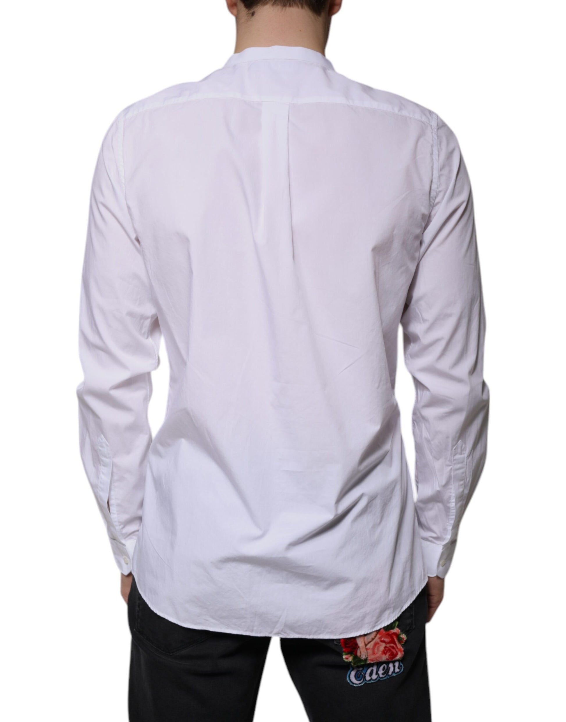A white cotton dress shirt with a slim fit, featuring a collar and long sleeves