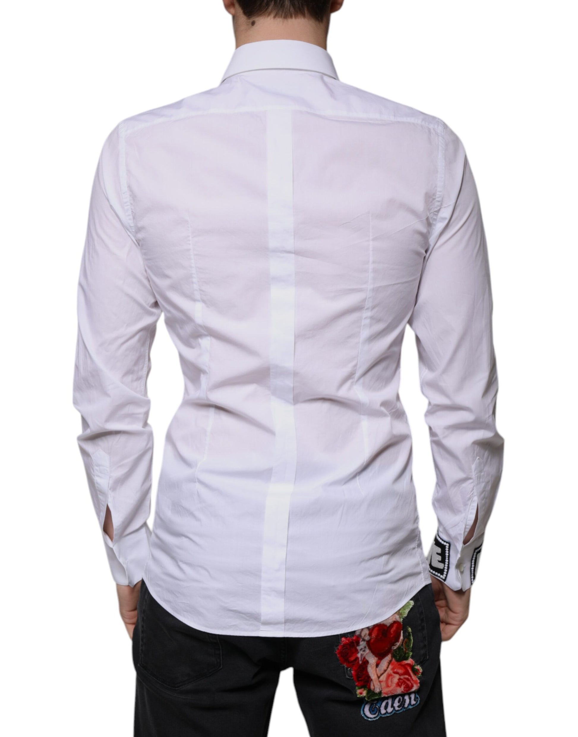 A white cotton dress shirt with a slim fit, featuring a gold design
