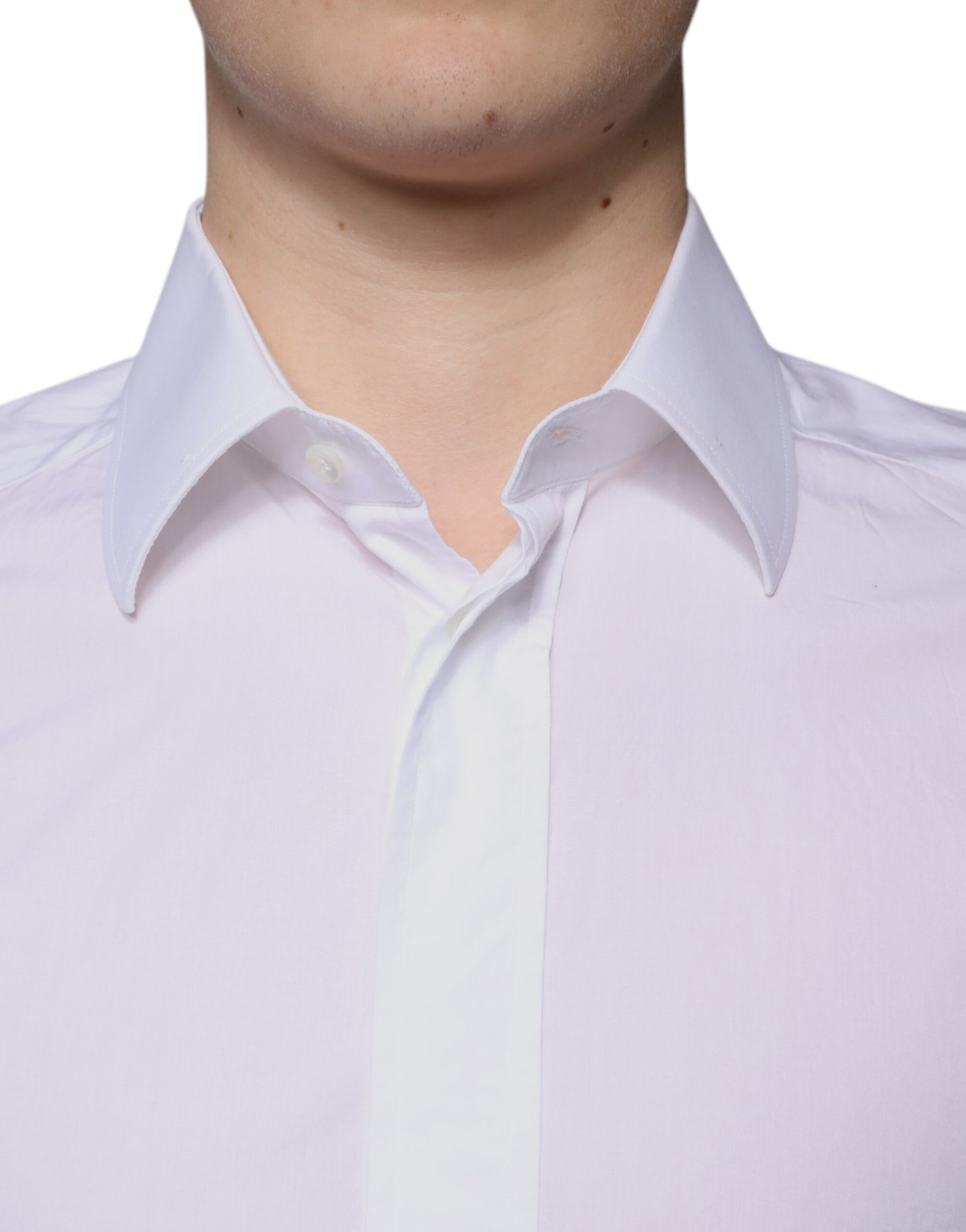 A mannequin wearing a white cotton slim fit men's dress shirt with a collar and gold accents