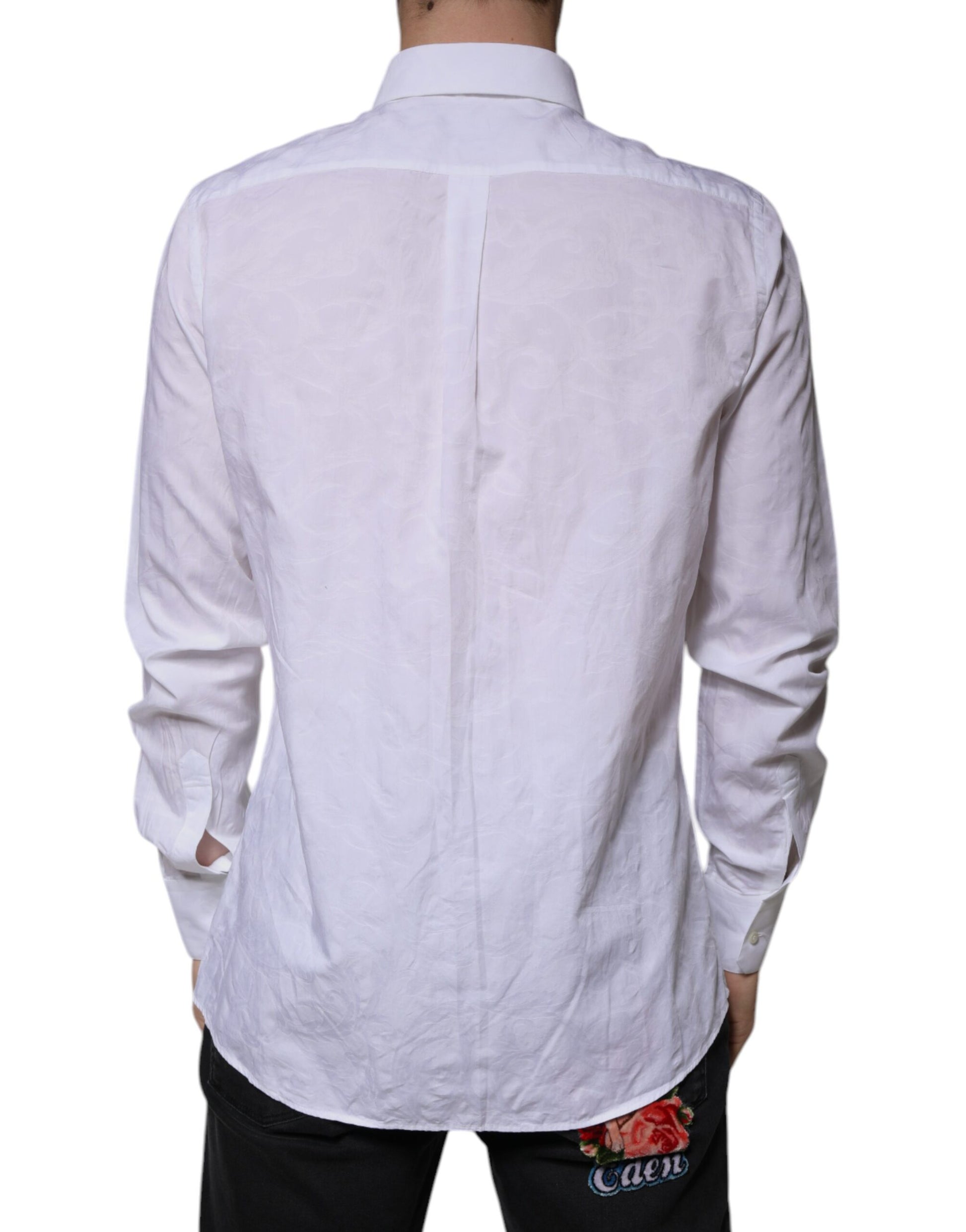 A white cotton dress shirt with a slim fit, featuring a collar and long sleeves