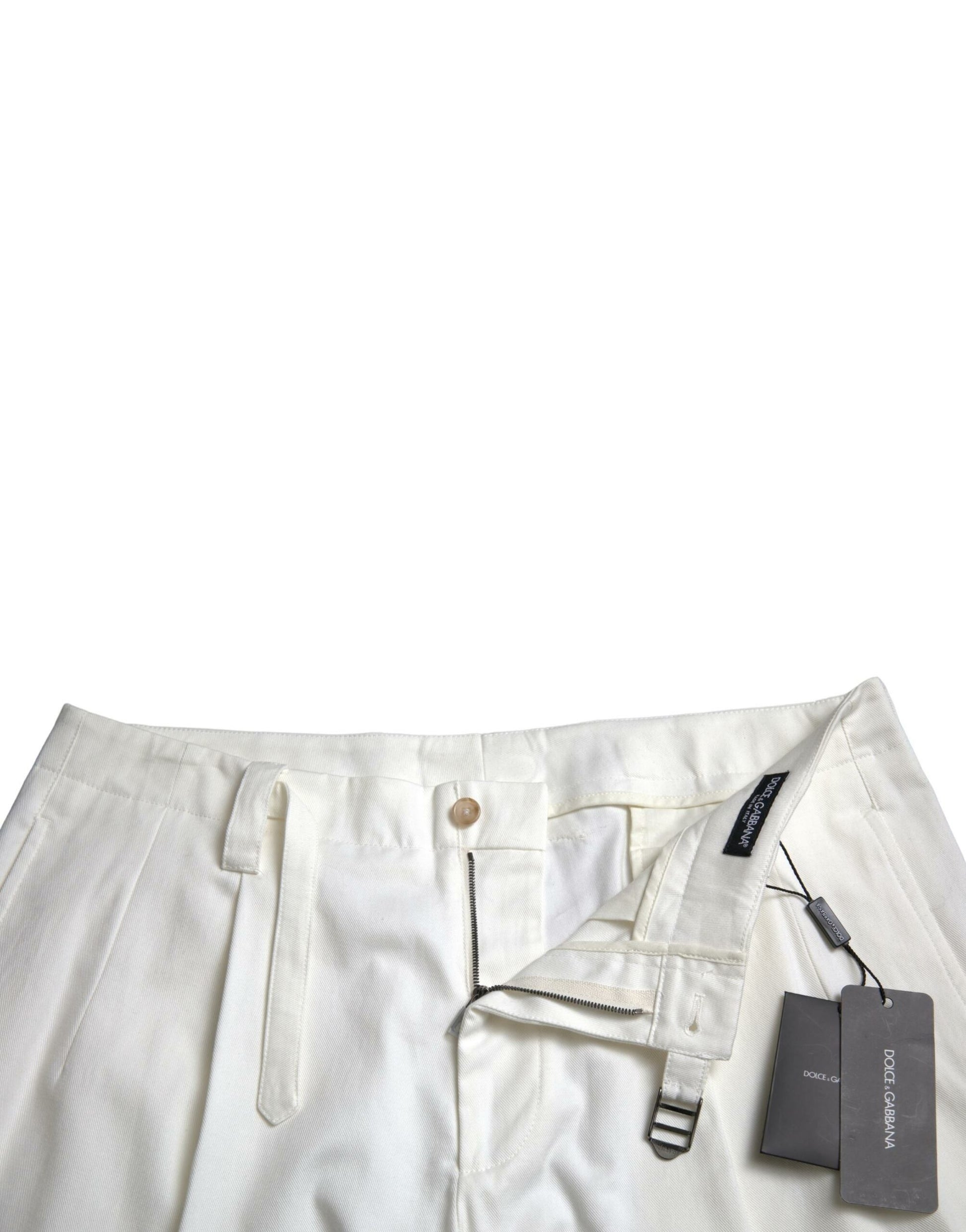 Pair of light beige trousers with a black label on the waistband
