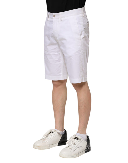 Man wearing white shorts and sneakers