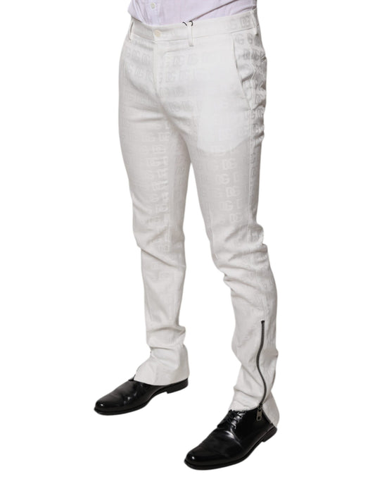 Man wearing white pants and black shoes