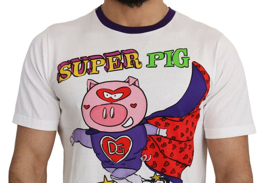A white cotton t-shirt with a graphic of a pink pig wearing a cape and heart on its chest