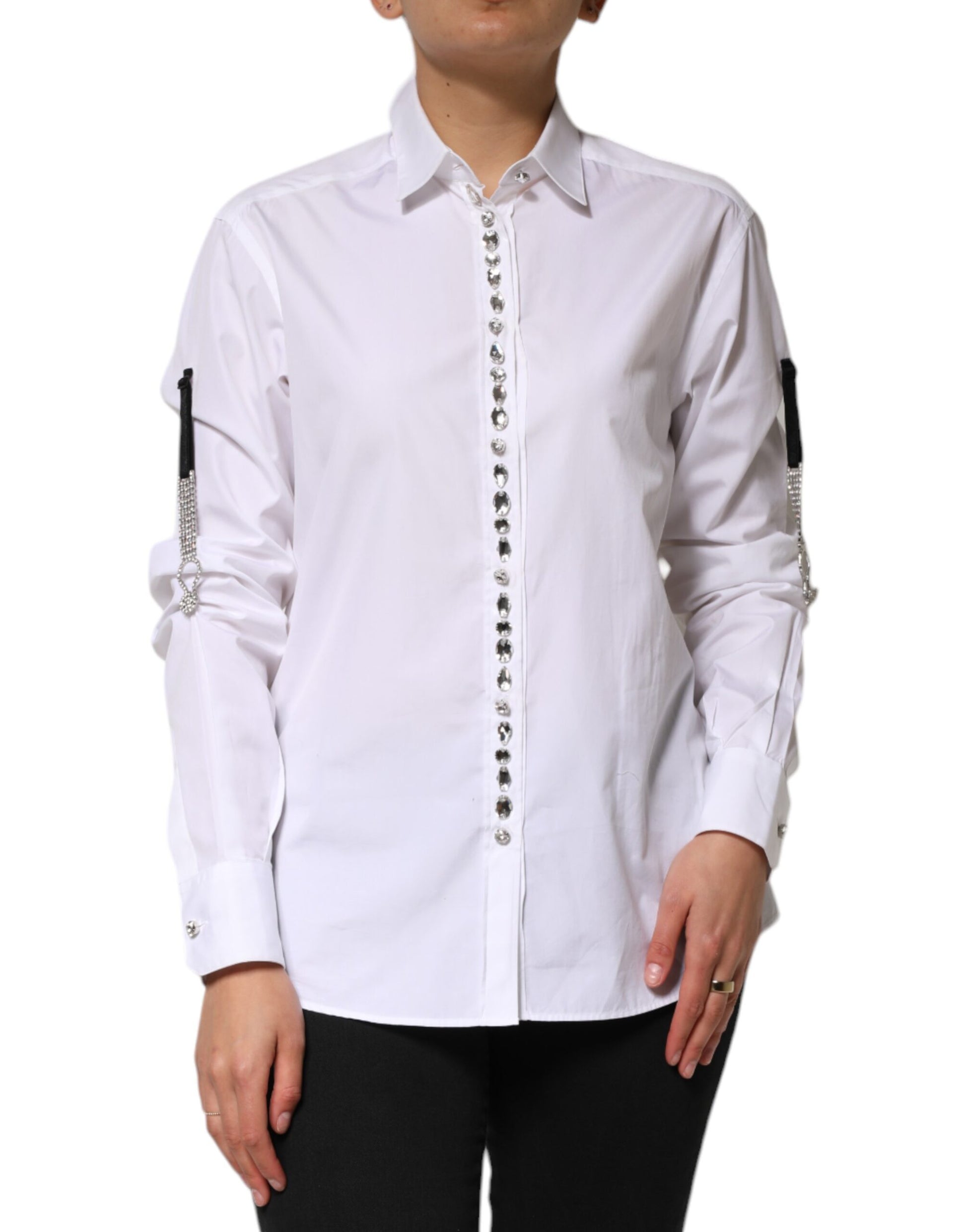 A white dress shirt with crystal embellishments on the sleeves and chest
