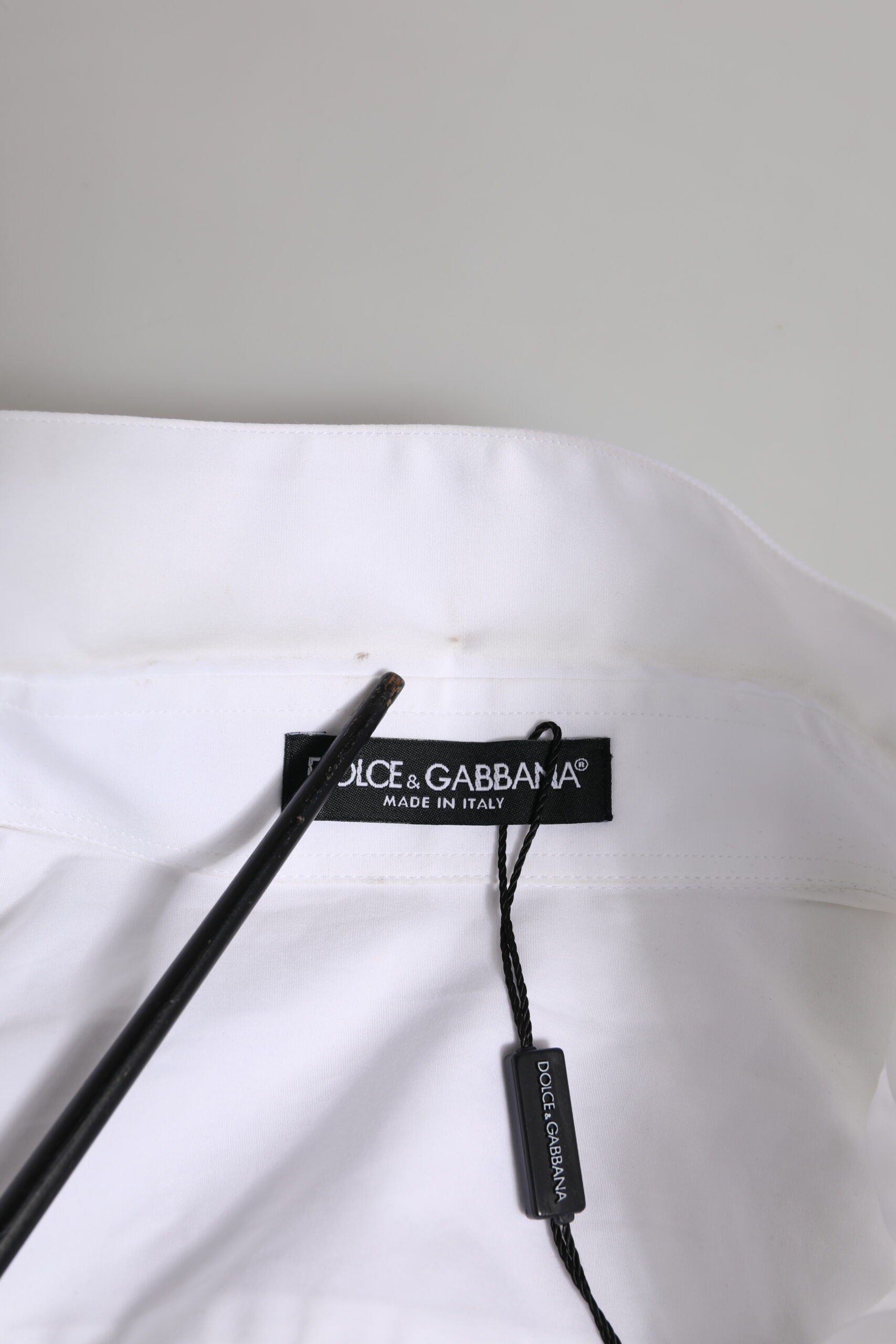 A white dress shirt with crystal embellishments from Dolce & Gabbana