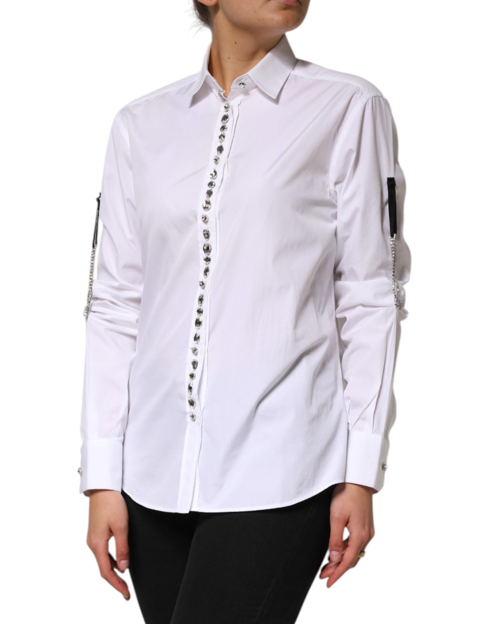 A white dress shirt with crystal embellishments on the sleeves and front