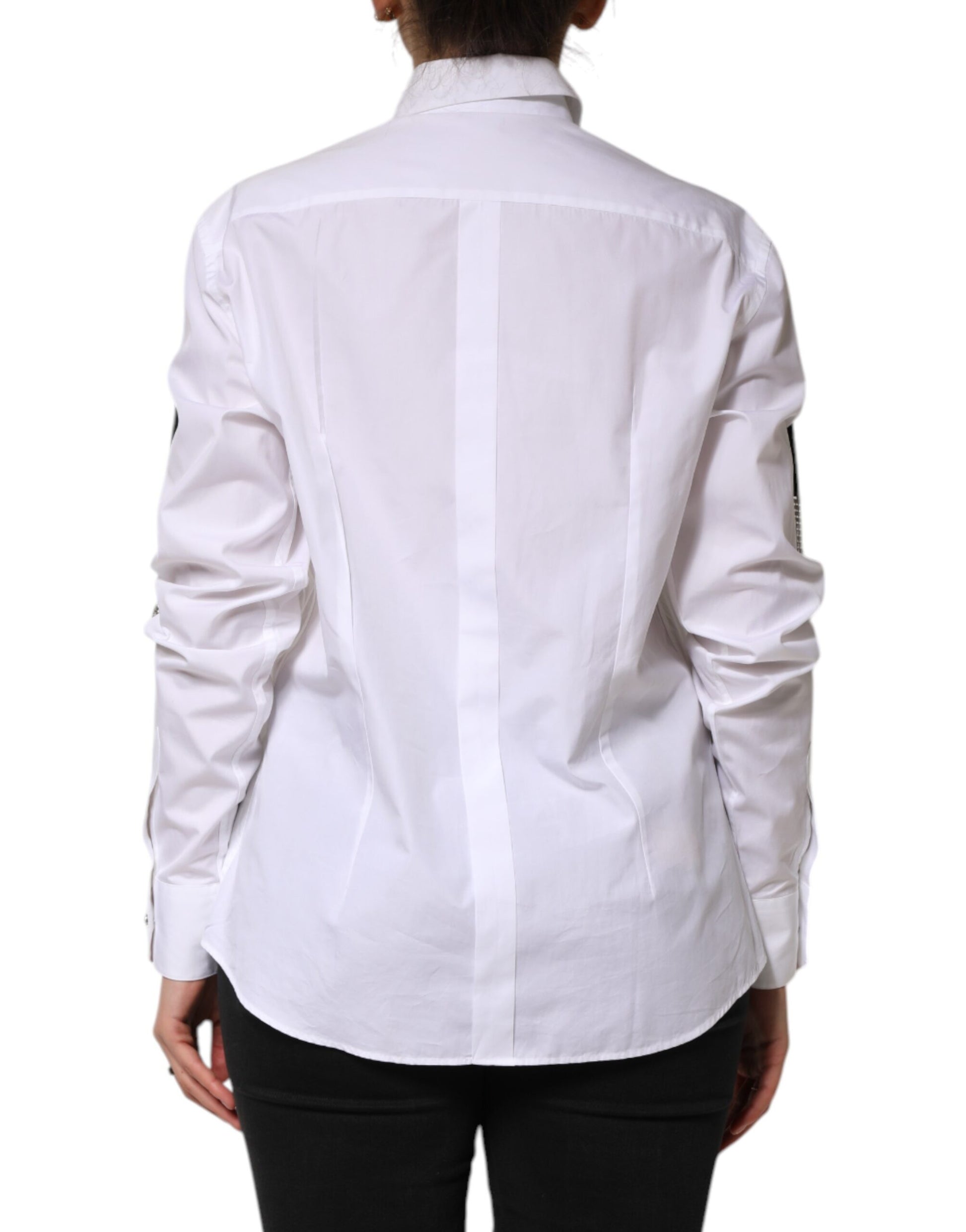 A white dress shirt with crystal embellishments on the shoulders and back