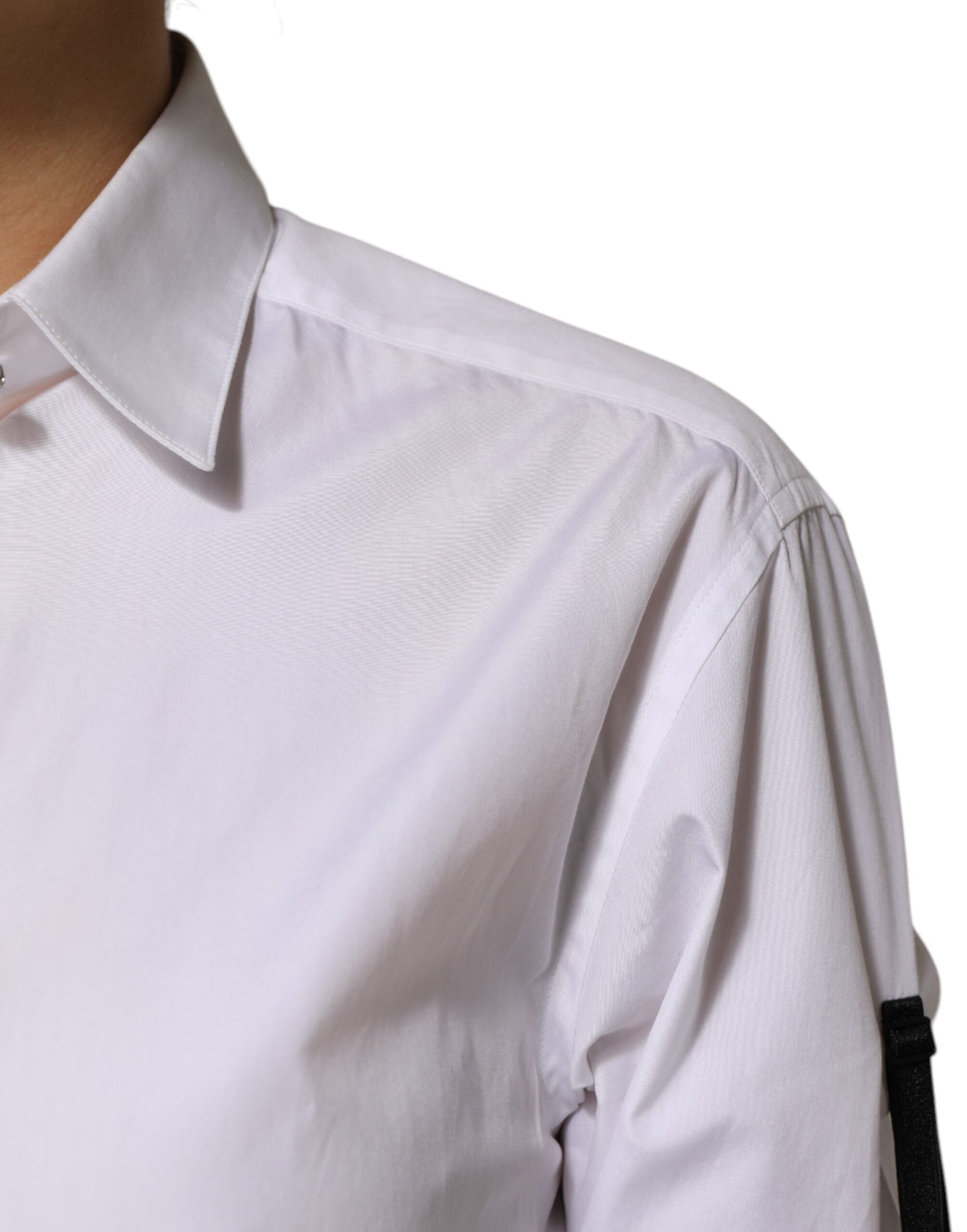 A white dress shirt with crystal embellishments on the shoulders and sleeves