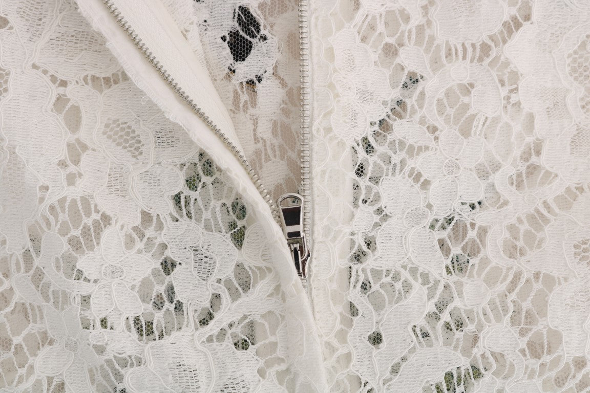 White lace fabric with embroidered flowers