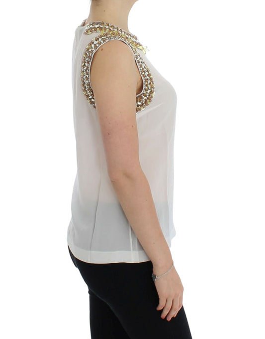 Woman wearing a sleeveless top with sequins on shoulders