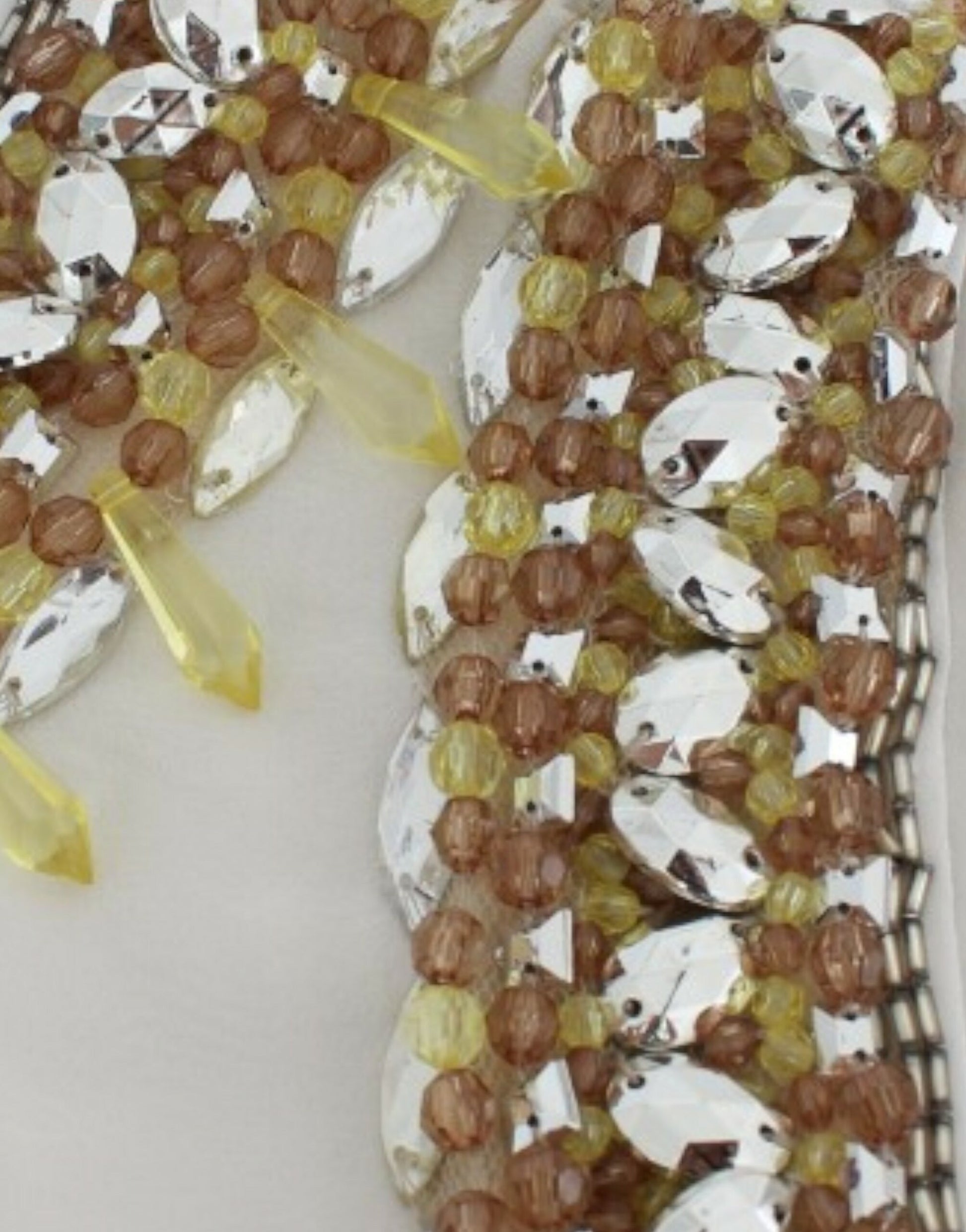 Decorative beaded necklace with yellow stones