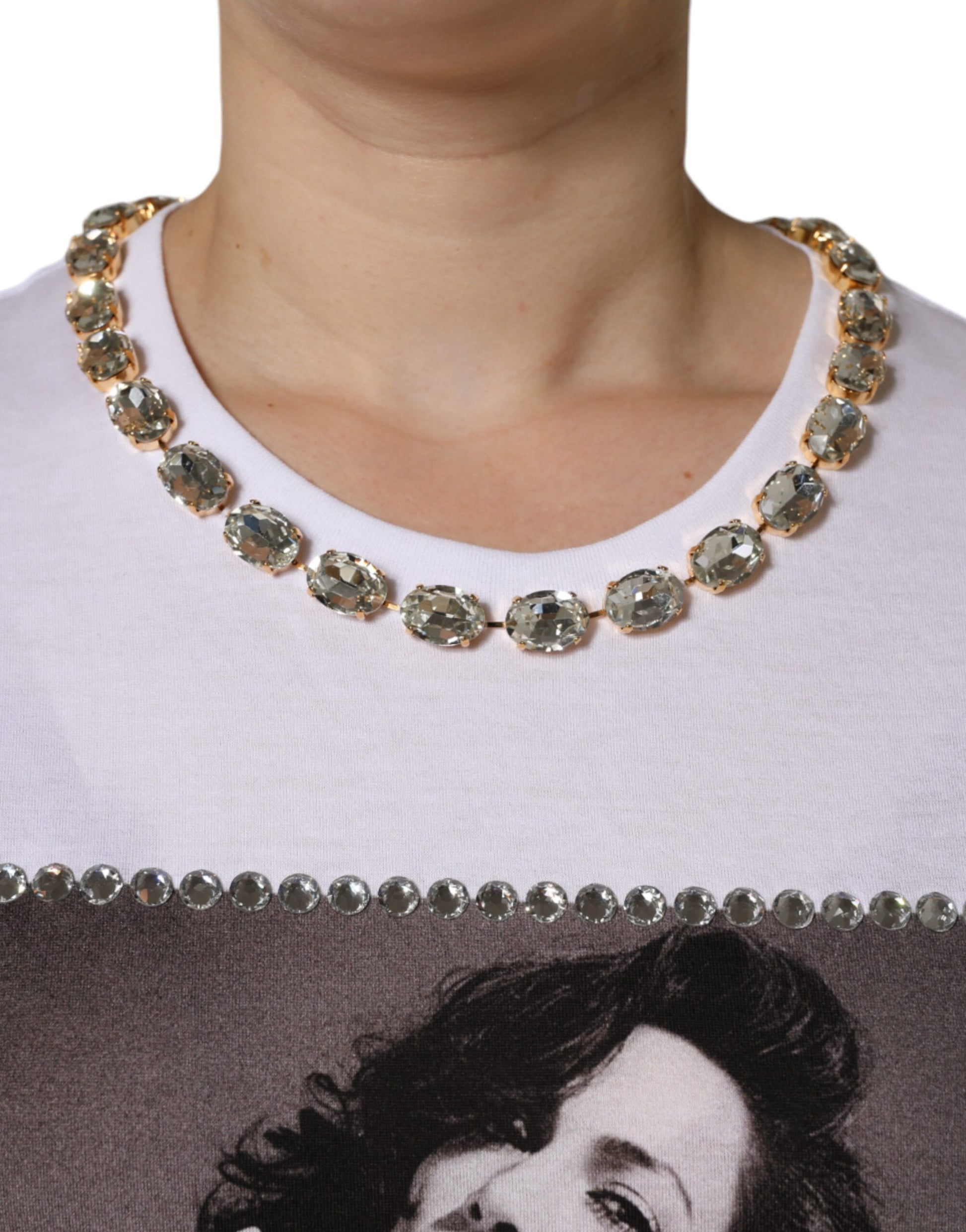 Woman wearing a necklace with large stones