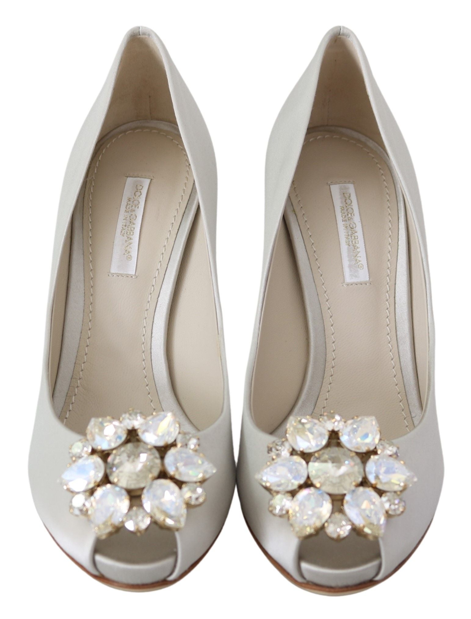Pair of women's dress shoes with embellished heels and straps