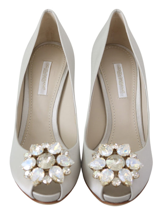 Pair of women's dress shoes with embellished heels and straps