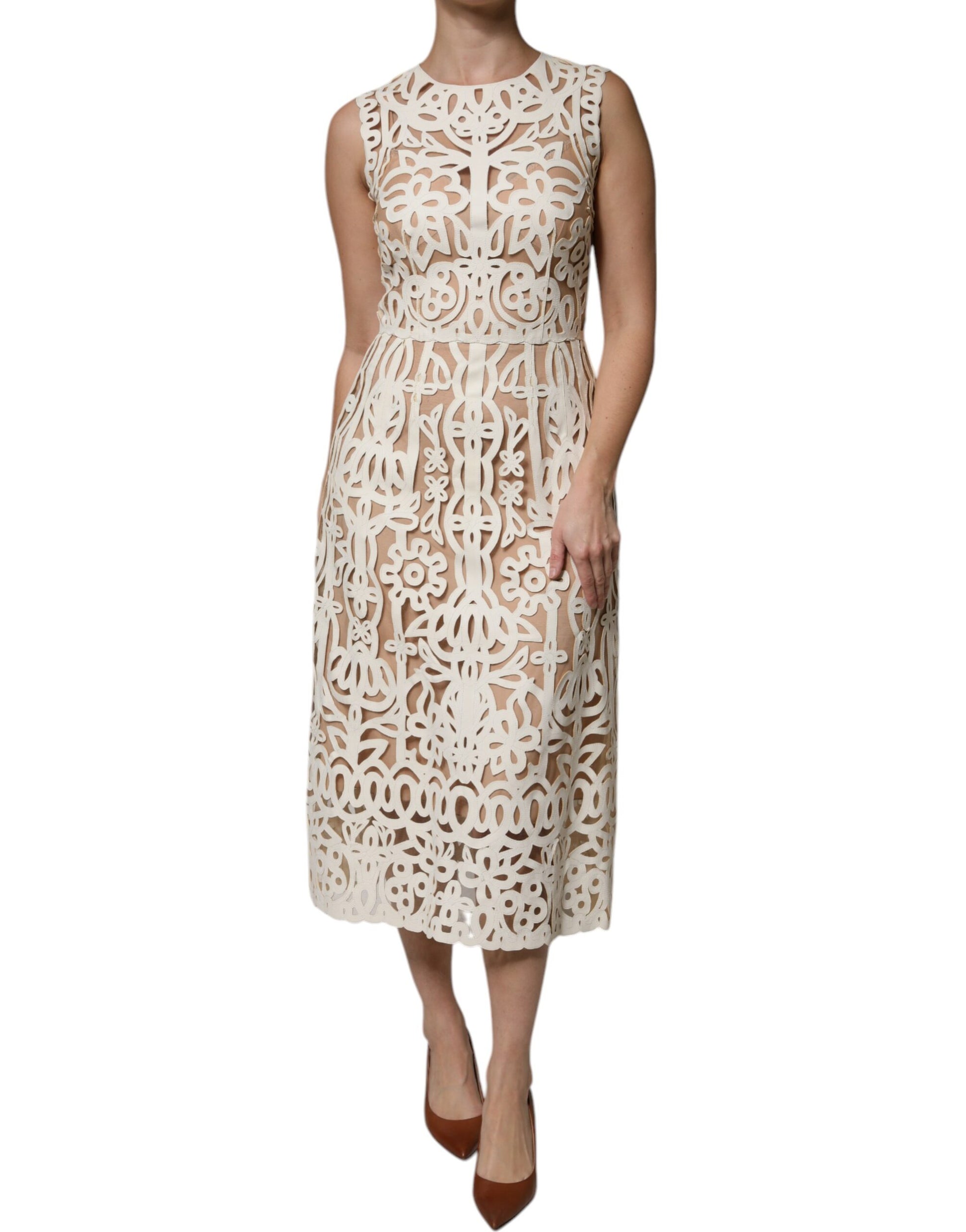 A sleeveless midi dress with cut-out detailing, made of leather