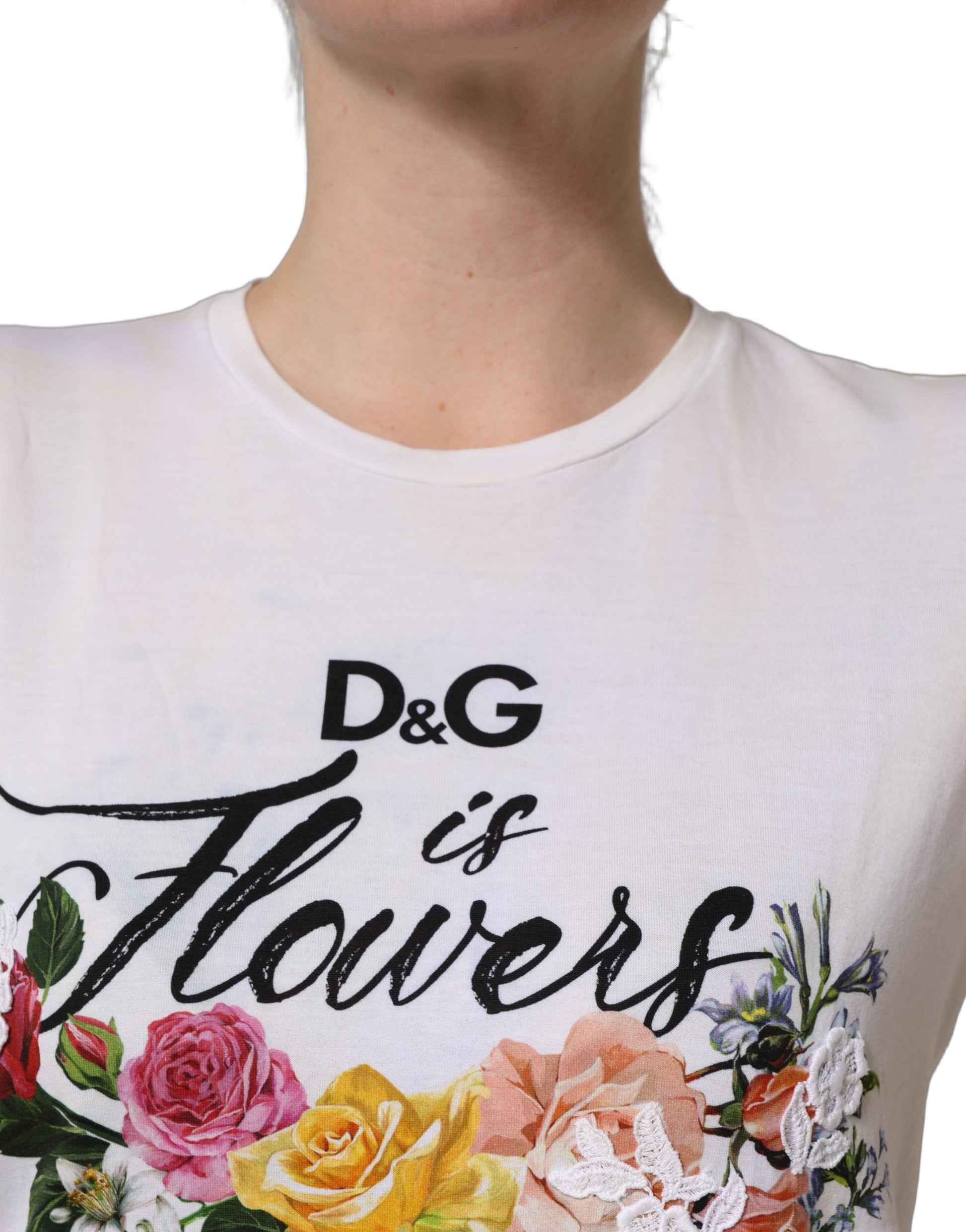 A white t-shirt with a floral print and the text "D&G is Flowers" printed on it