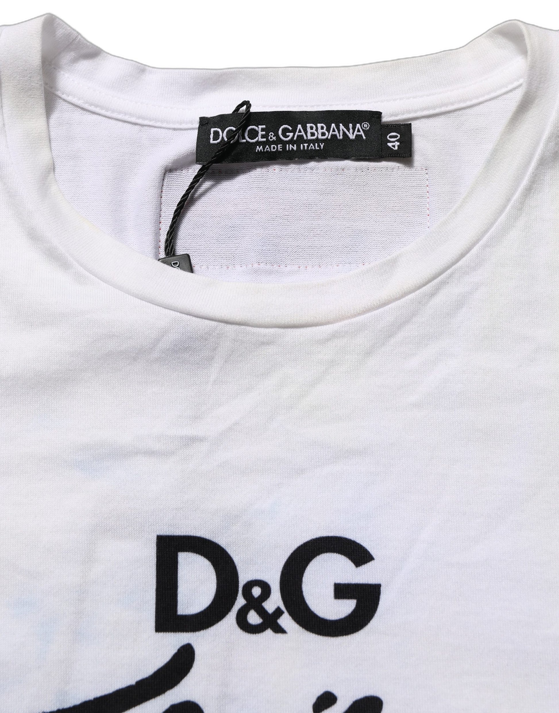 A white t-shirt with a floral print and the brand name "D&G" in black letters