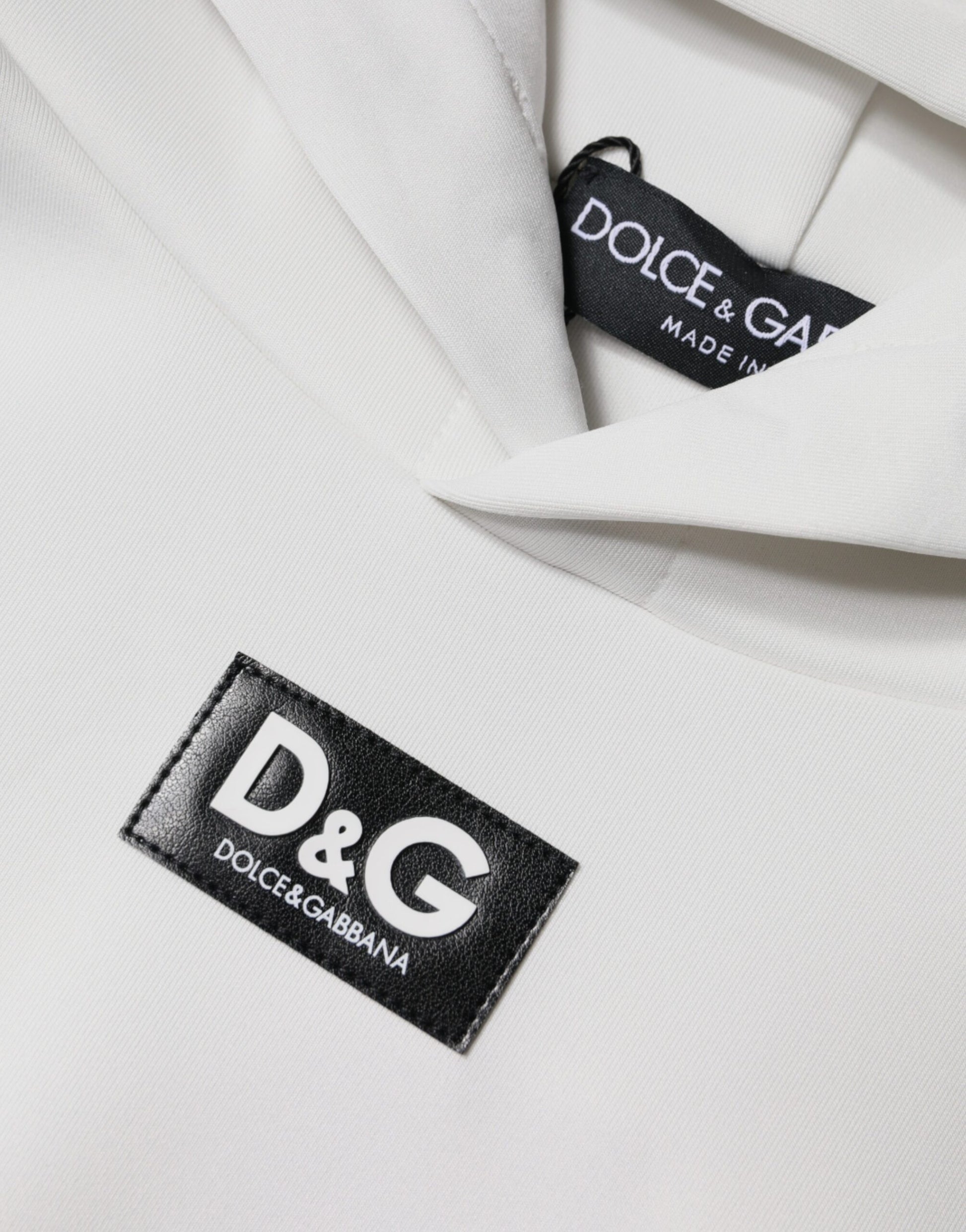 White shirt with black logo on front