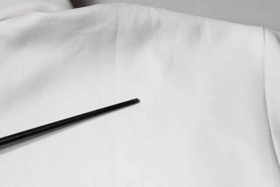 Black pen on white fabric