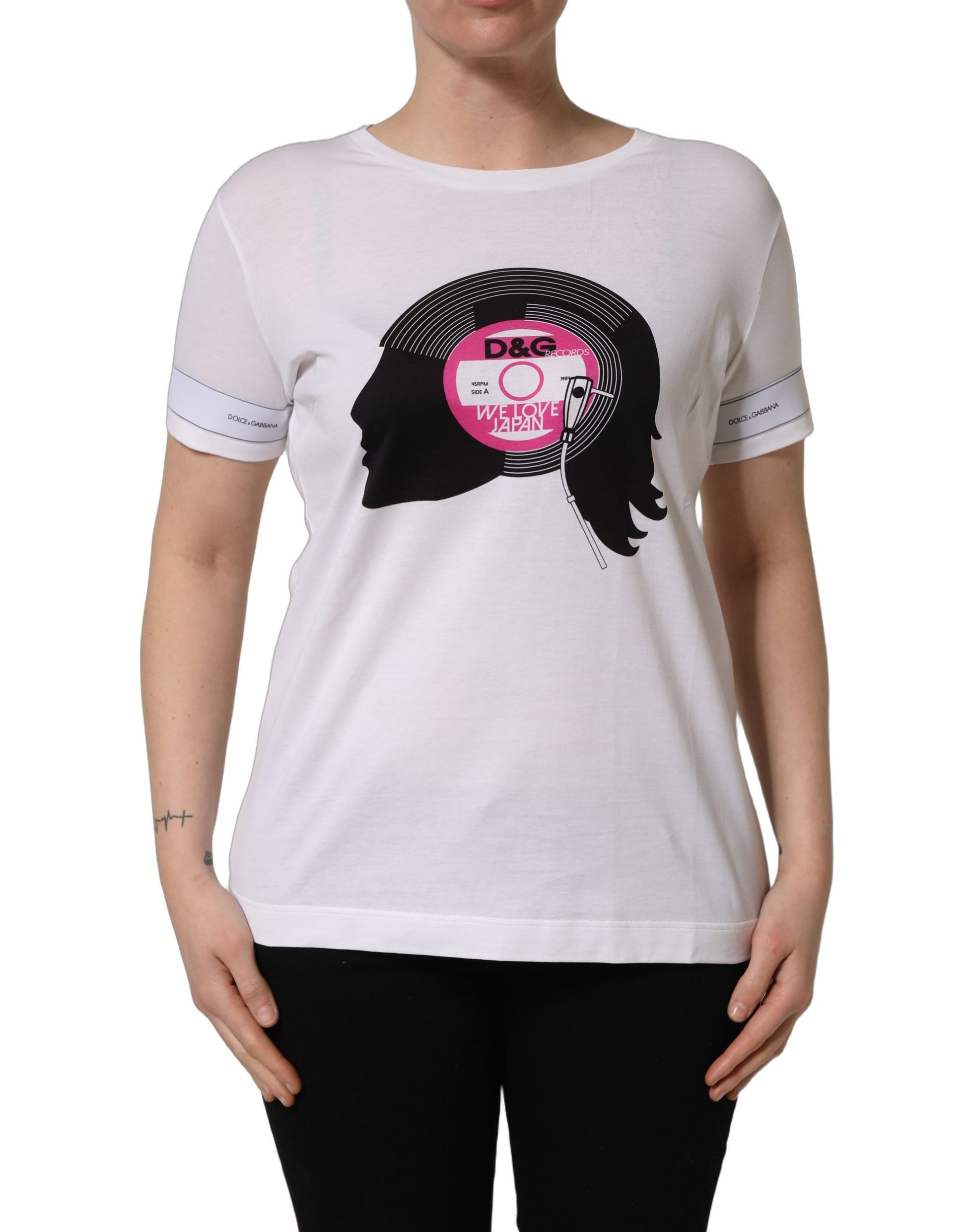 A white t-shirt with a graphic print of a woman's face and the text "WE LOVE JAPAN" in pink