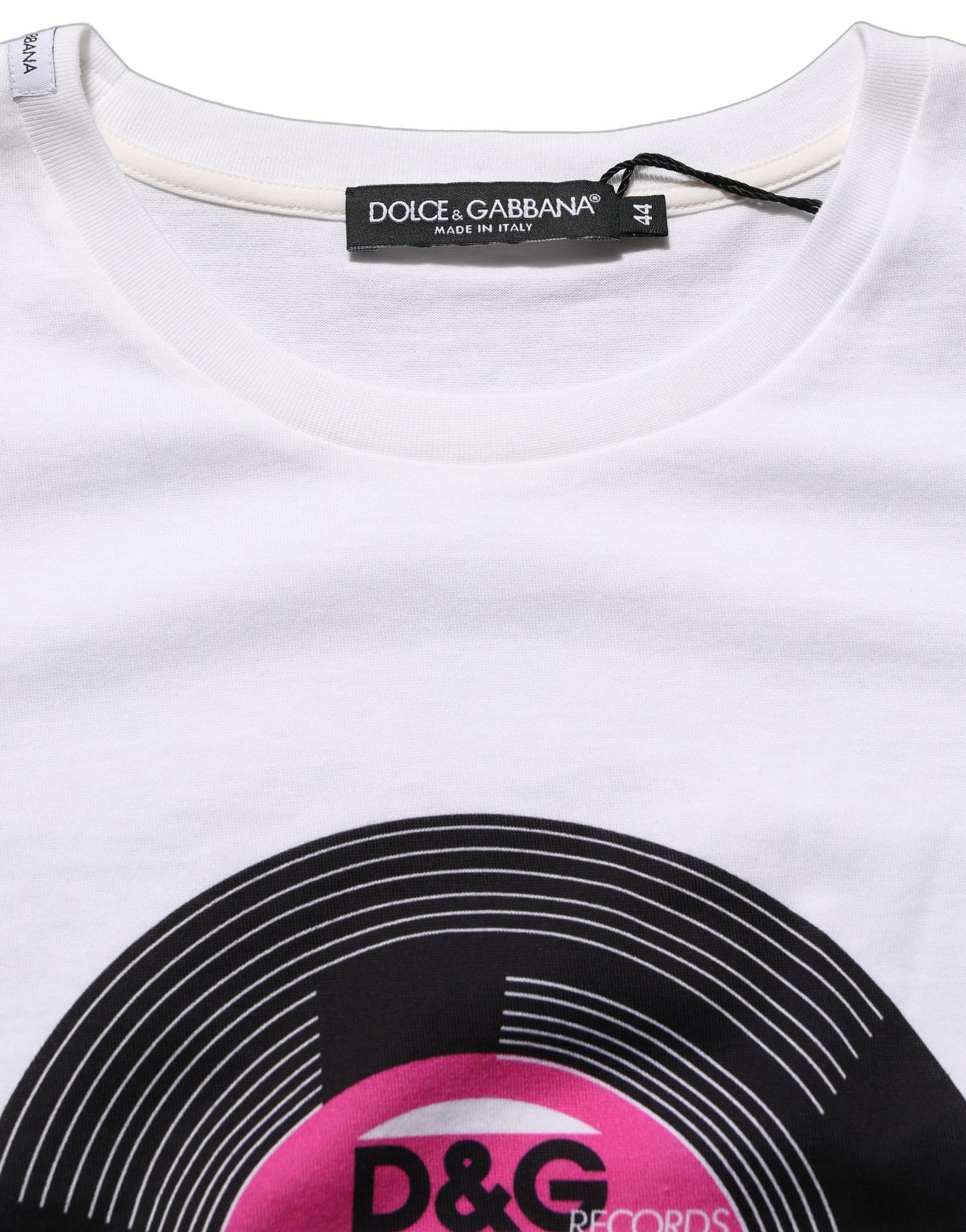 A white t-shirt with a print of records and the text "D&G" in pink
