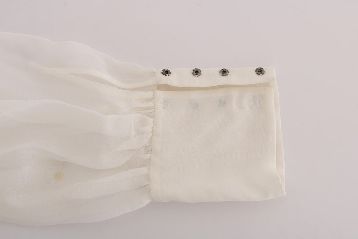 White lace baby dress with ruffles on sleeves