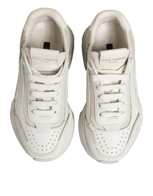 Pair of white sneakers with black laces