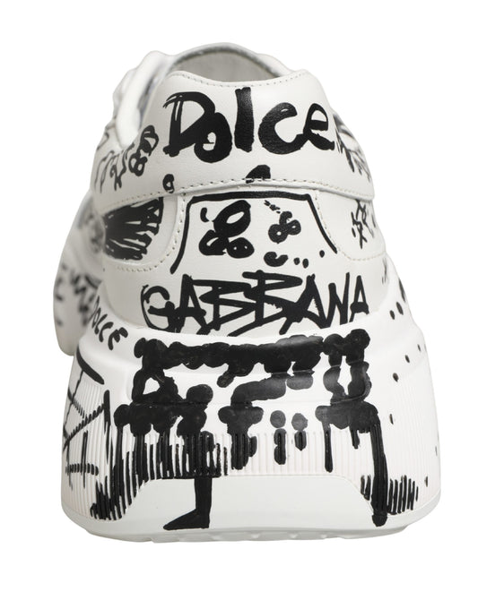 White sneakers with graffiti design on side