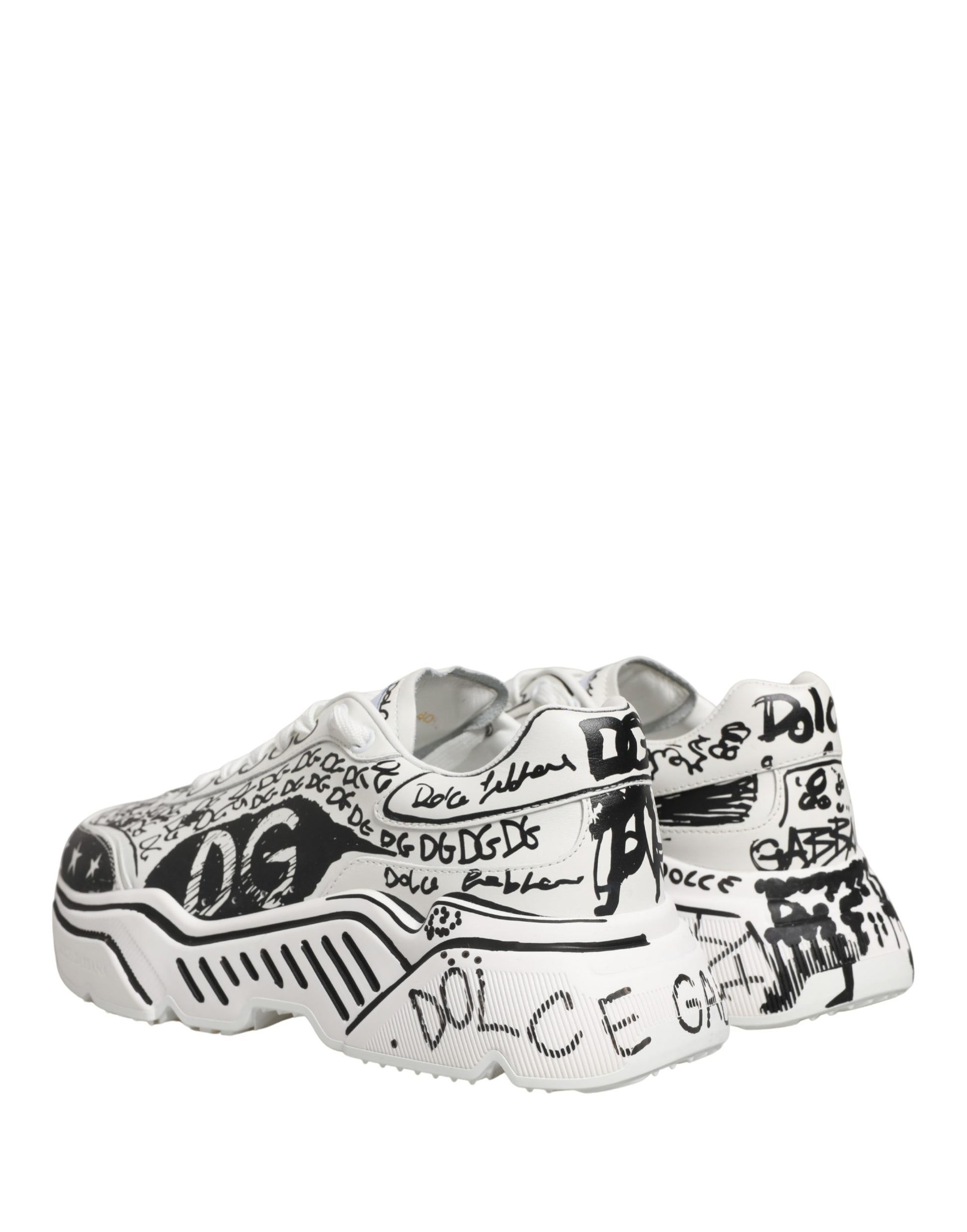 White sneakers with graffiti design, featuring text and graphics on side panels