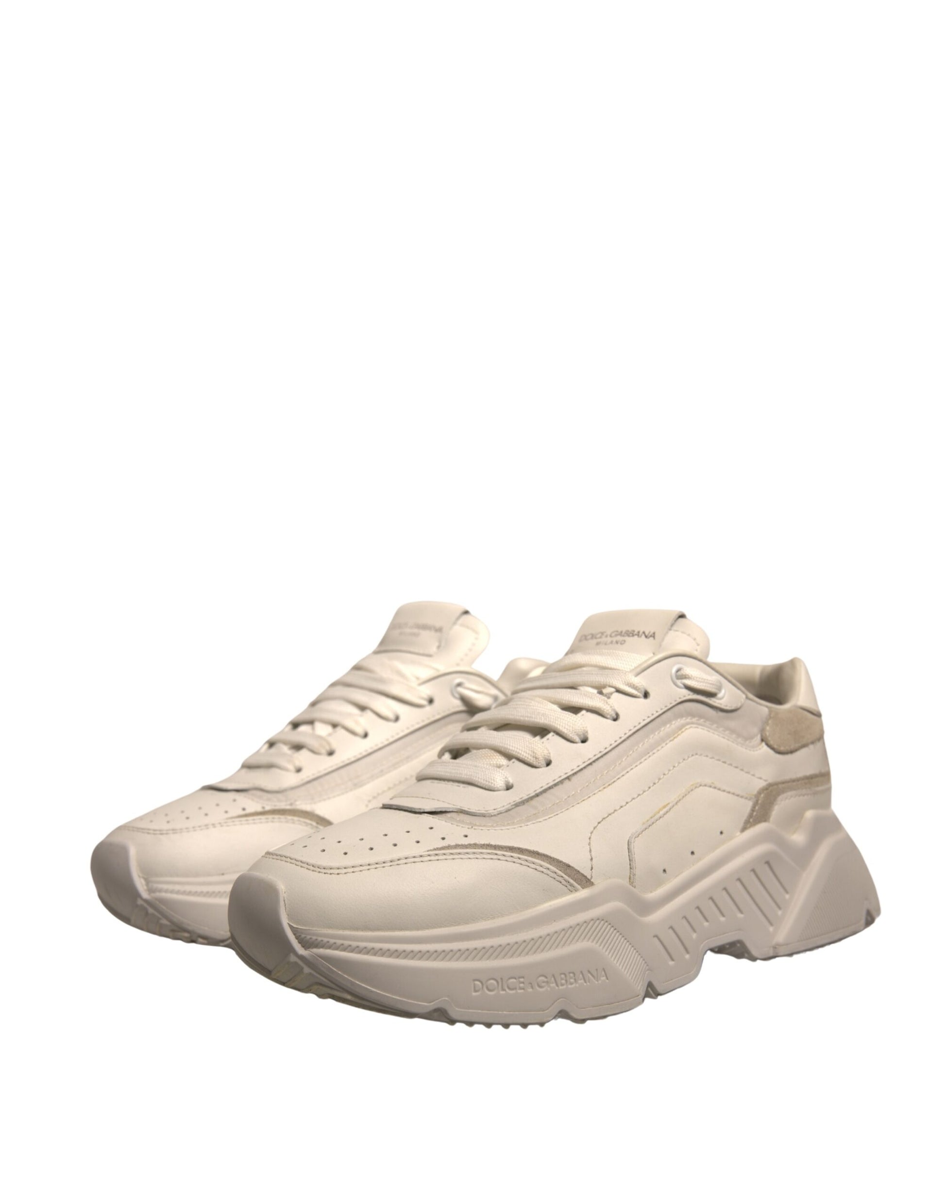 Pair of white sneakers with black laces