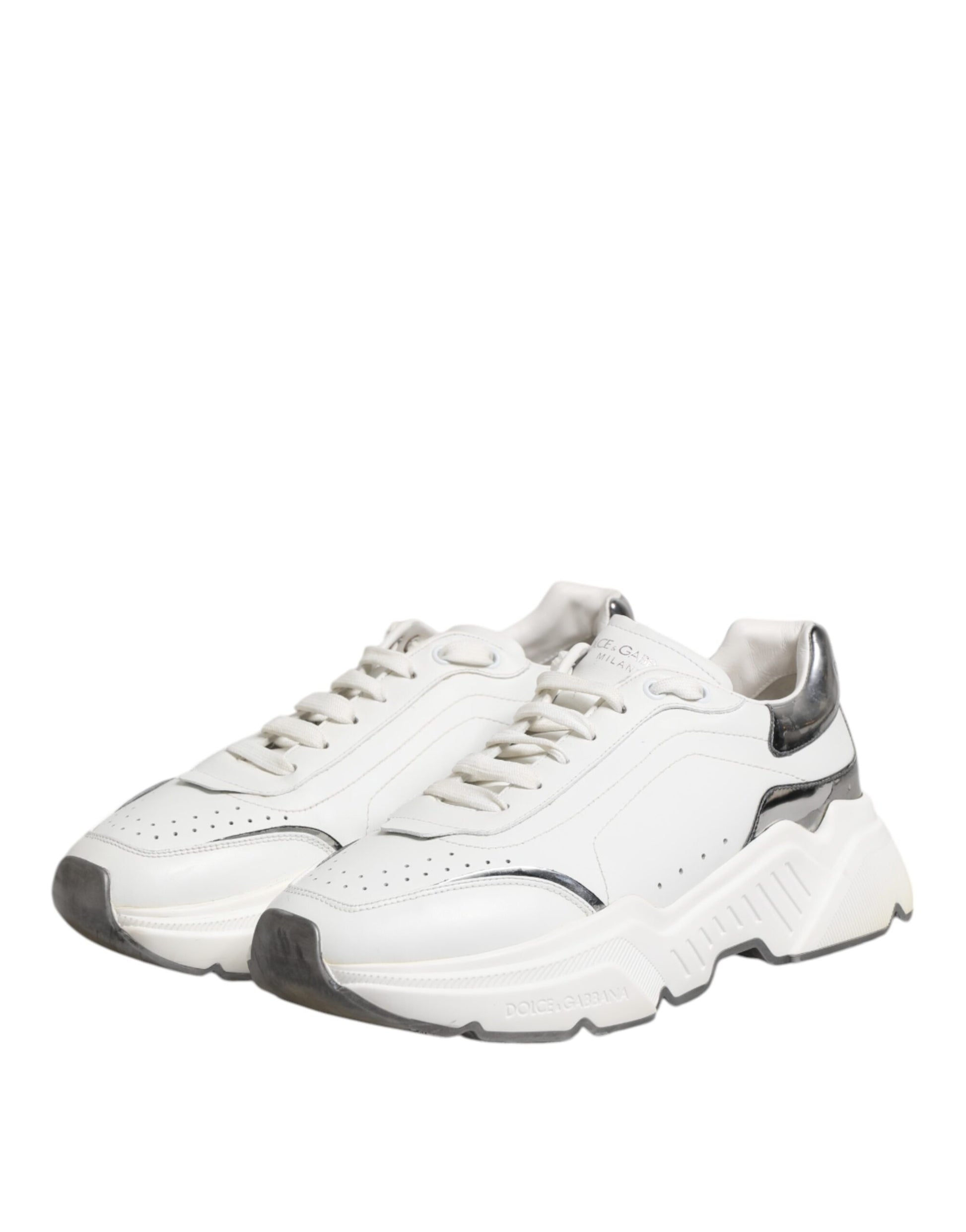 White leather sneakers with black laces, logo on side and tongue