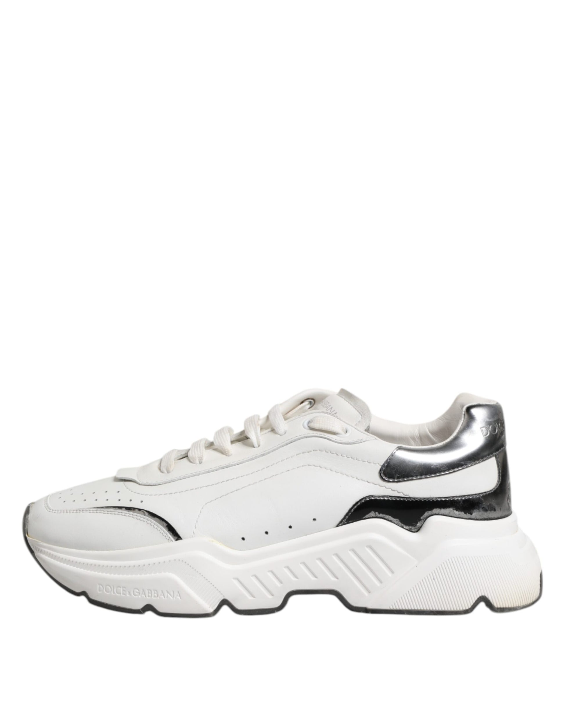 White leather sneakers with black laces, logo on side and tongue