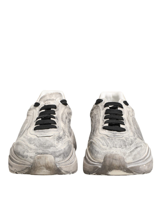 Pair of men's sneakers with white laces and black accents, from the brand Dolce & Gabbana