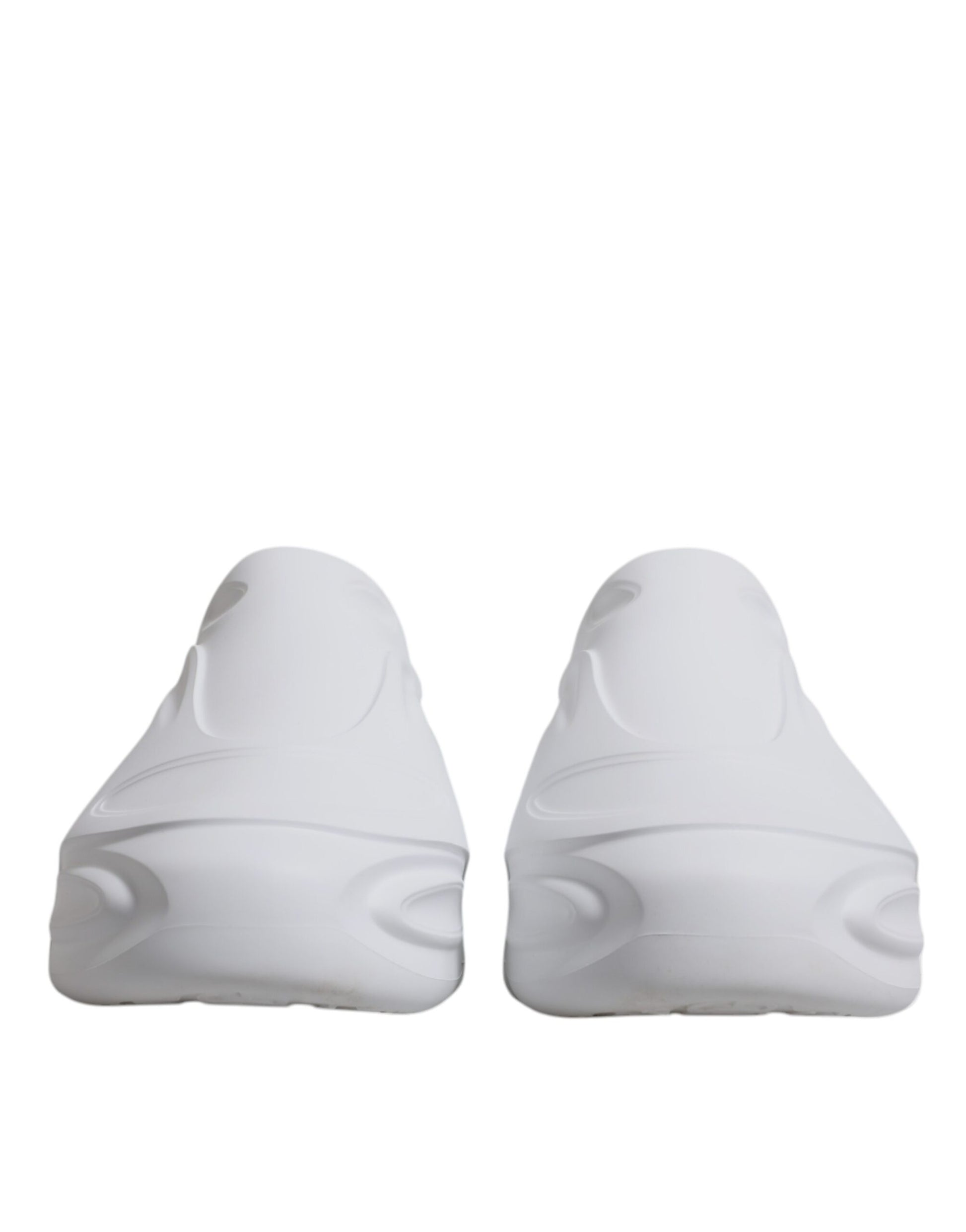 Pair of white sneakers with black laces and soles