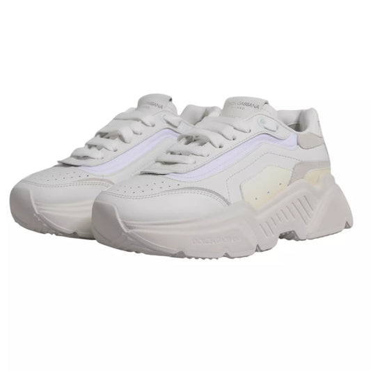 Pair of white sneakers with laces, featuring a low top and a logo on the side