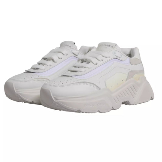 Pair of white sneakers with pink accents