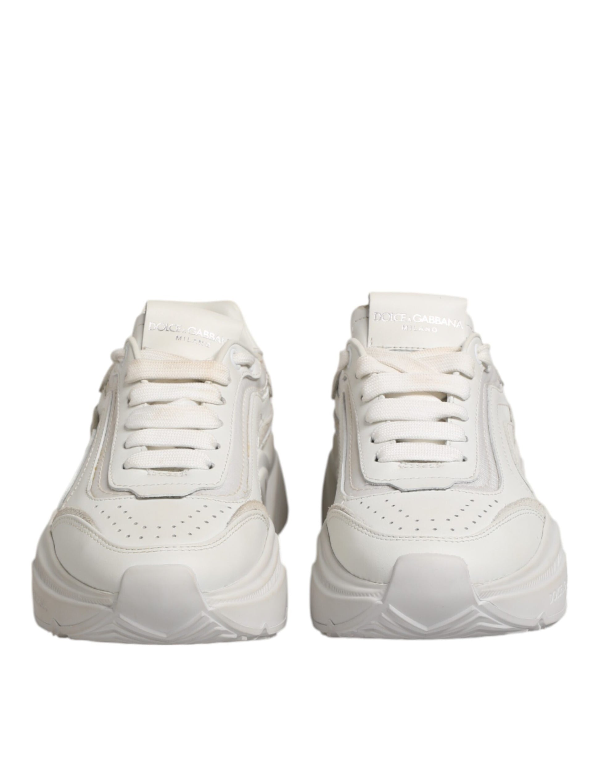 Pair of white sneakers with laces, branded logo on side and back, low top design