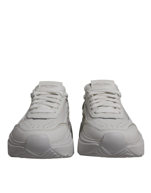 Pair of white sneakers with laces