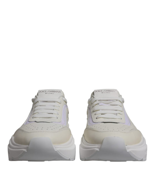 Pair of white sneakers with laces