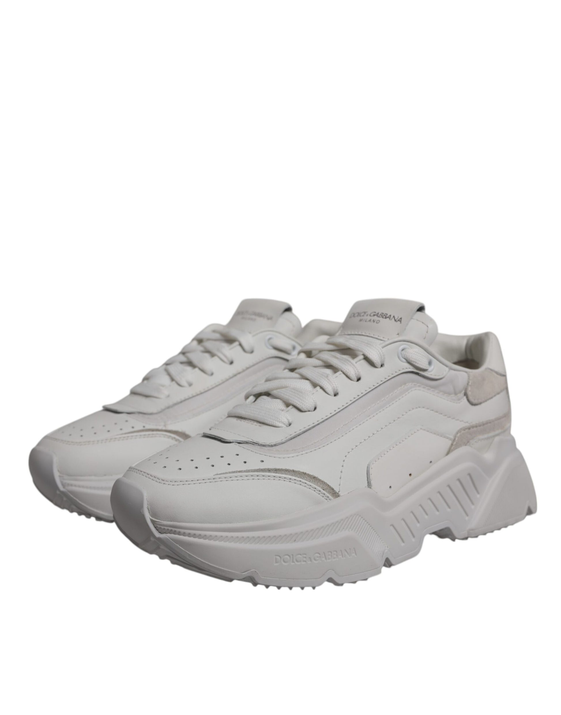 Pair of white sneakers with black laces