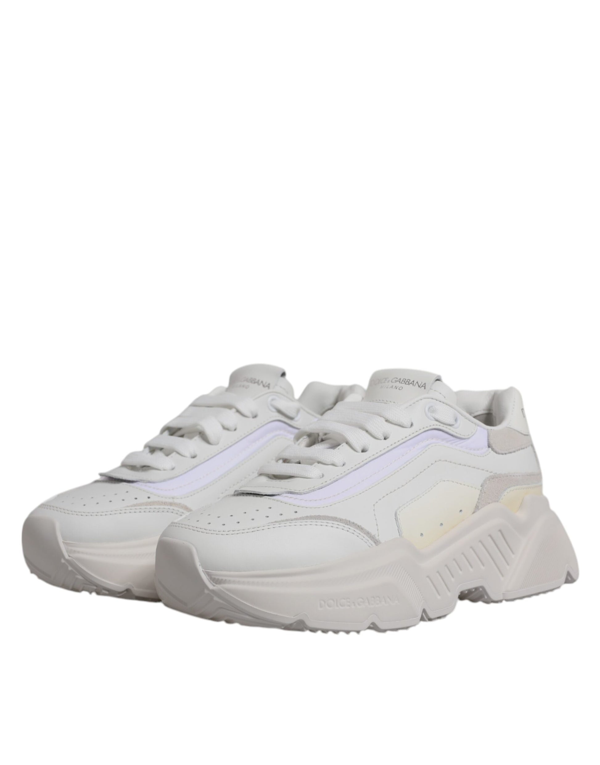 Pair of white sneakers with purple accents