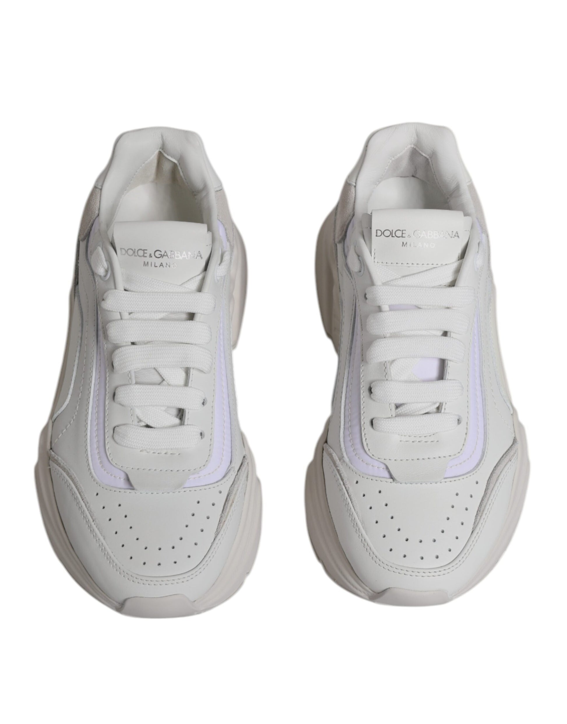 Pair of white sneakers with purple accents