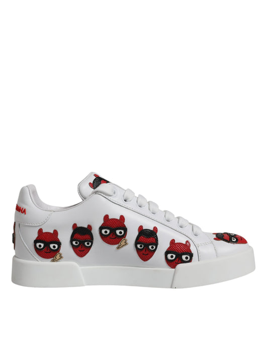 White sneaker with red devil face pattern on side