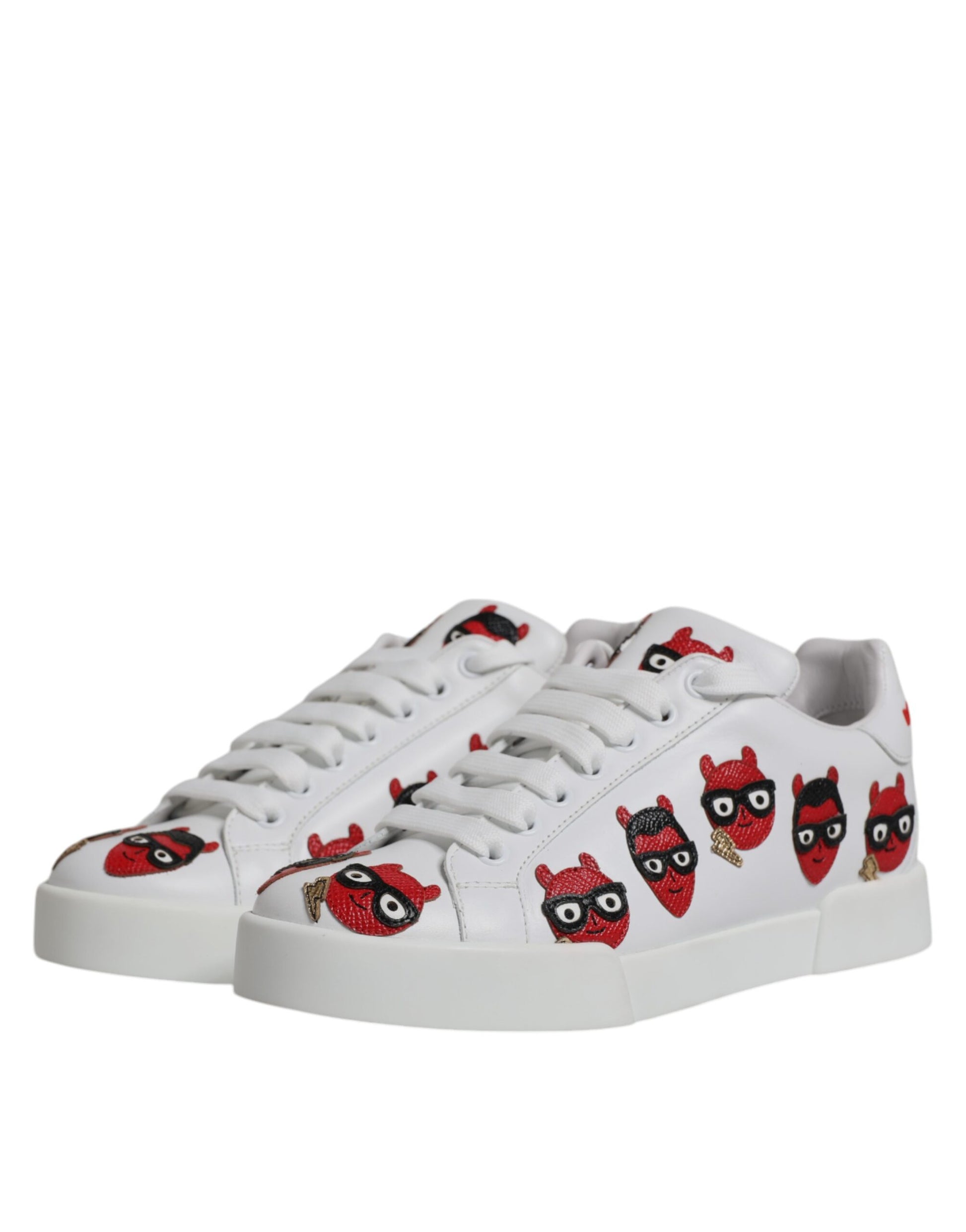 White sneakers with red and black cartoon character designs on side panels