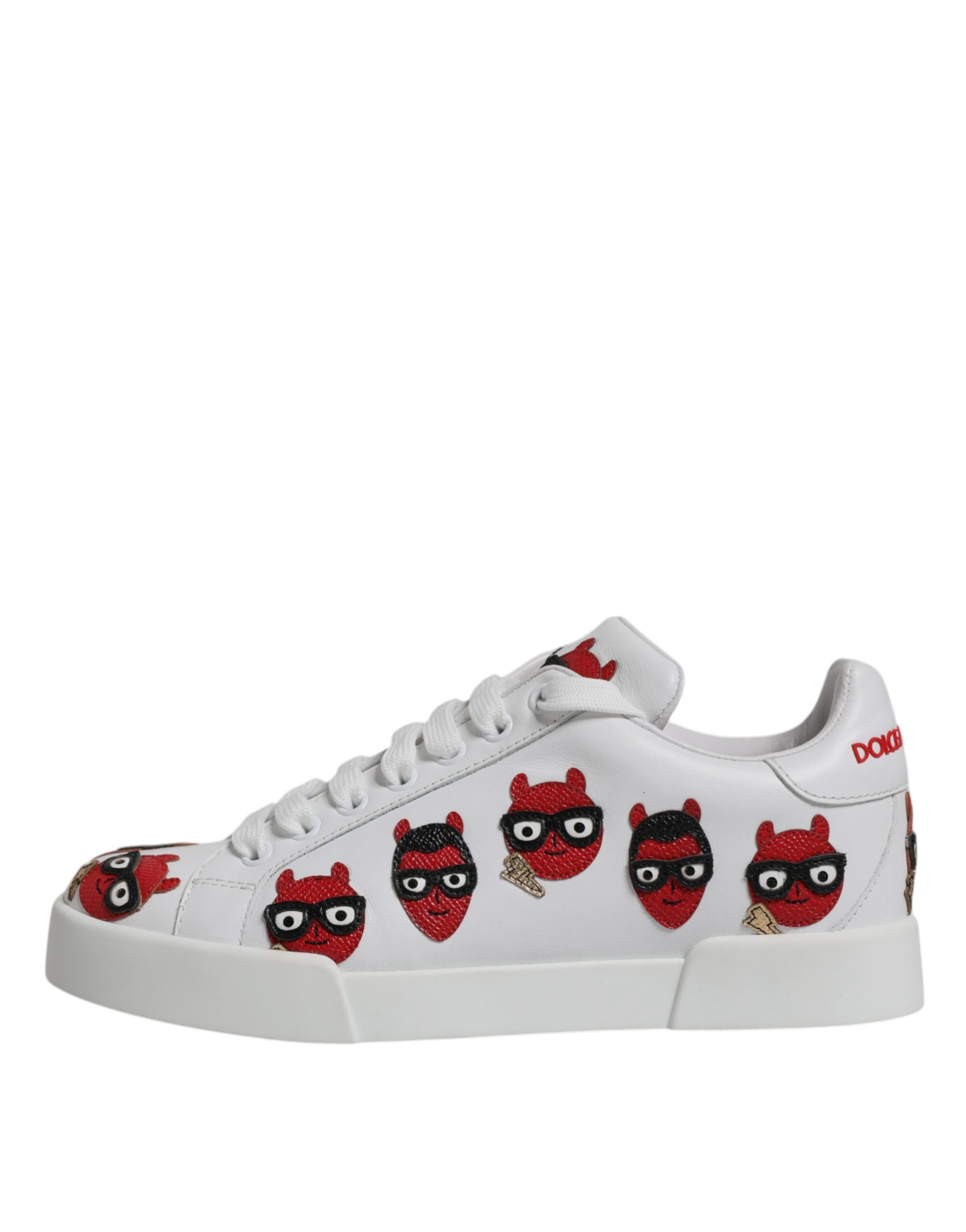 White sneaker with red devil face pattern on side