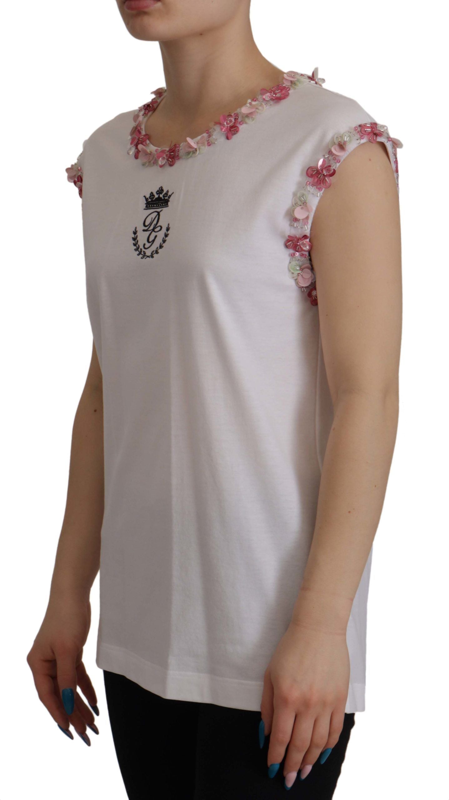 White sleeveless top with floral embroidery on front